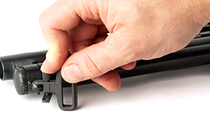 Sling Swivel Mount Attachment to Mossberg 500 stud step three, placing the lock through the stud
